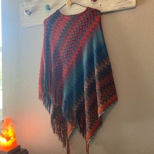 Woman’s sweater type thingy. Tag cut out